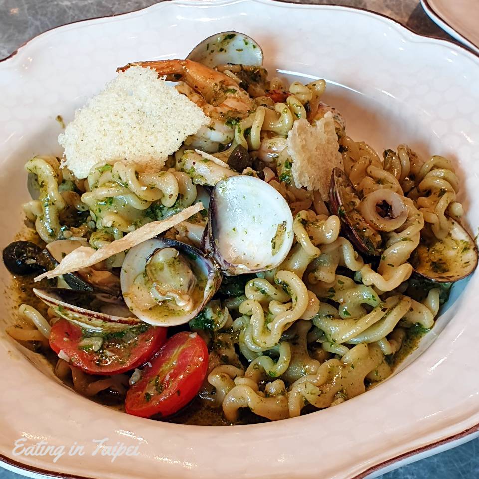 The seafood was abundant and the pasta was married beautifully with a nicely fresh pesto.